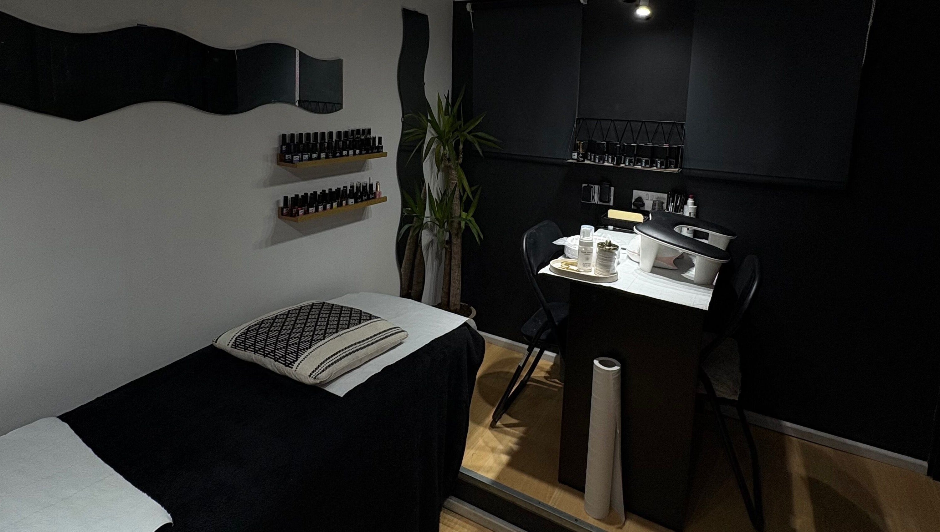 Cozy beauty room at Builder and Brows by Khloe in Sandy, England, GB, featuring a treatment table and stylish decor.
