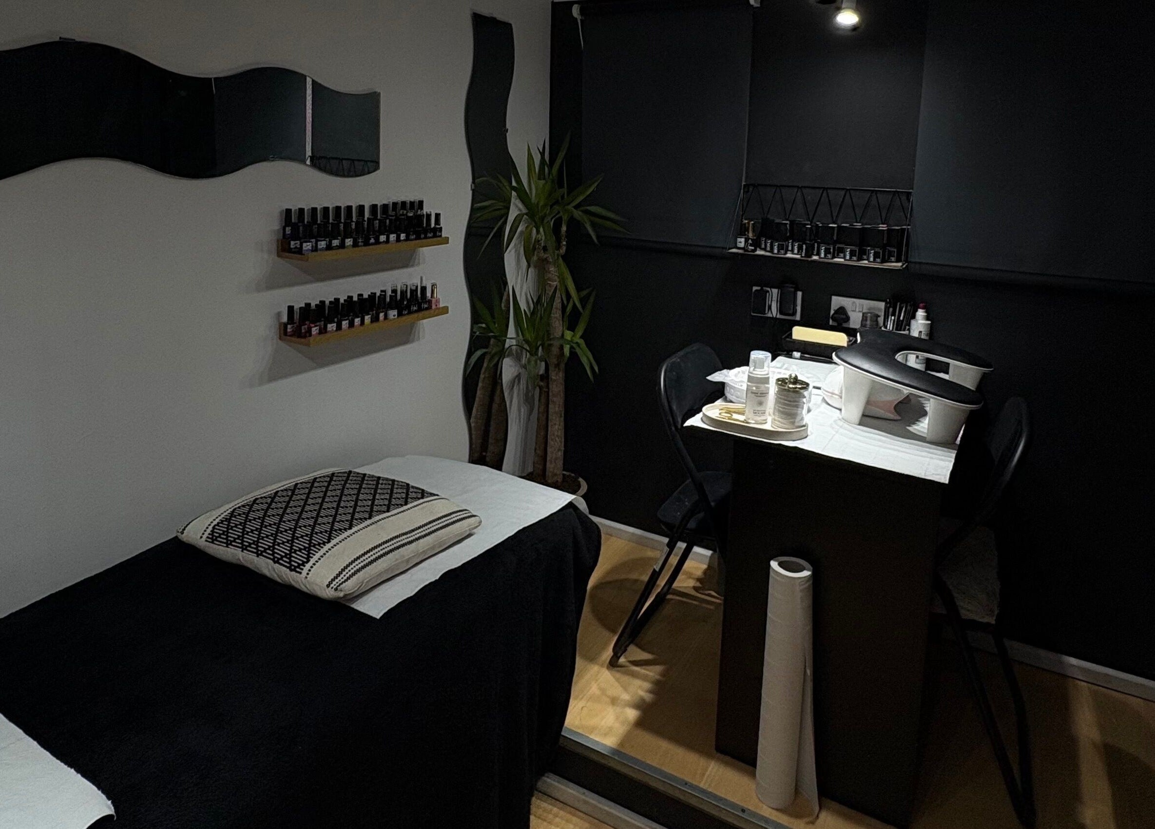 Cozy beauty room at Builder and Brows by Khloe in Sandy, England, GB, featuring a treatment table and stylish decor.