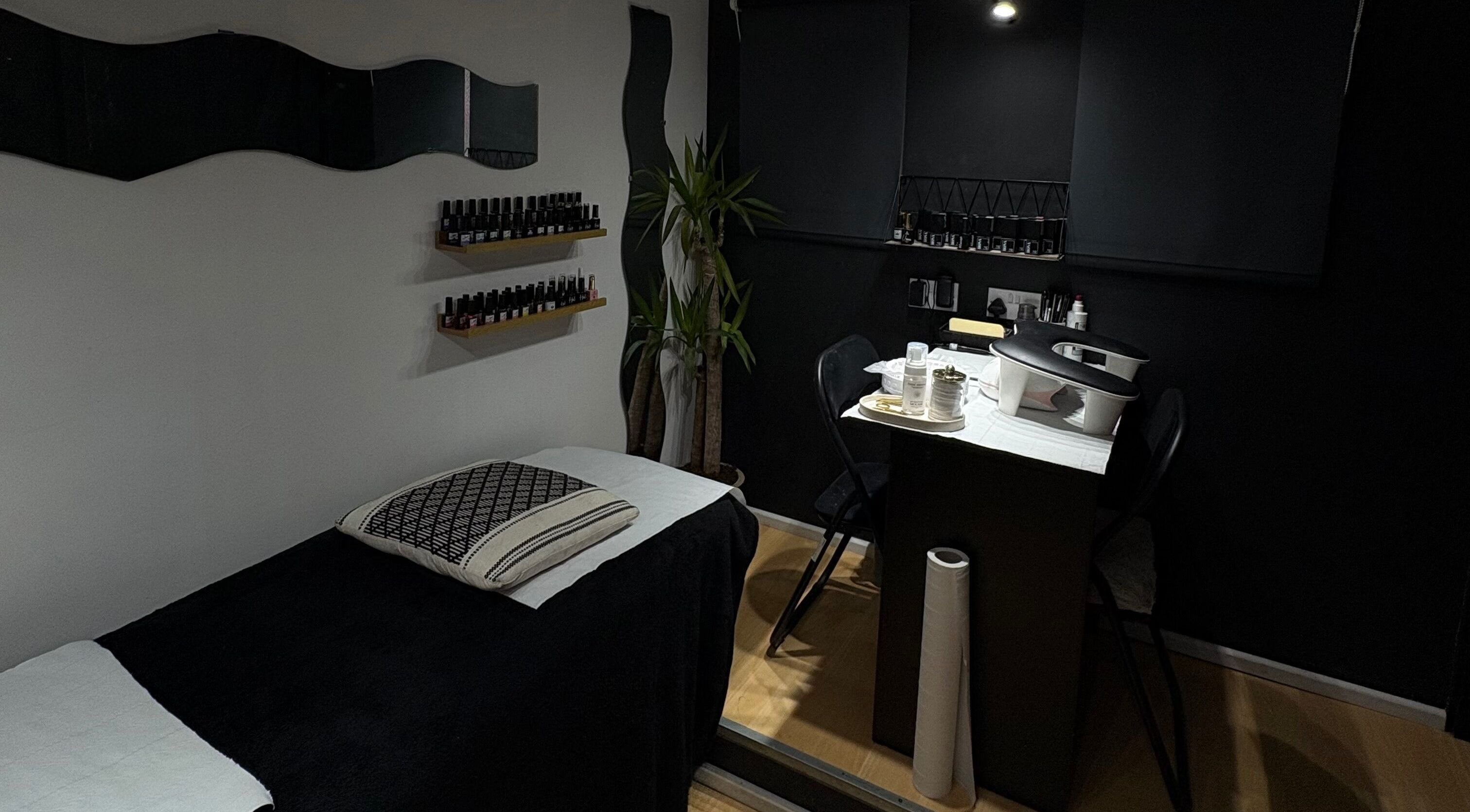 Cozy beauty room at Builder and Brows by Khloe in Sandy, England, GB, featuring a treatment table and stylish decor.