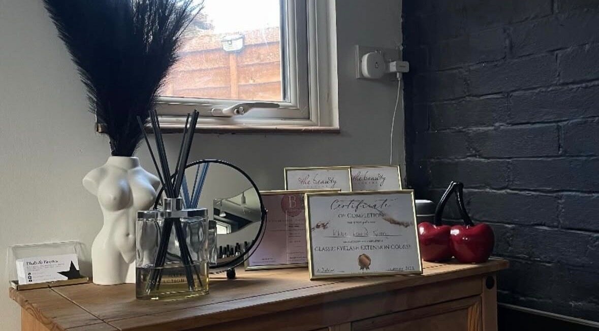 Elegant decor at Builder and Brows by Khloe, Sandy, England enhancing the beauty salon's ambiance with artistic touches.