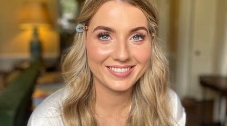 Smiling woman with makeup by Kellie Fitzgibbon Makeup & Lash Artist in Stepaside, County Dublin, IE.