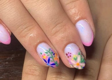 Floral nail art at The Nailwork Lounge in Mid Calder, Scotland, GB, showcasing intricate designs and vibrant colors.