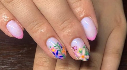 Floral nail art at The Nailwork Lounge in Mid Calder, Scotland, GB, showcasing intricate designs and vibrant colors.