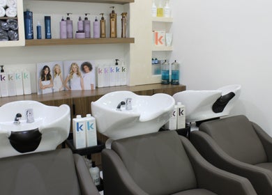 Chic wash stations at Kals Ladies Salon in Dubai, Dubai, AE featuring modern design and luxury products.