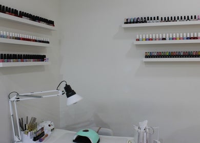Nail polish display and manicure station at Kals Ladies Salon, Dubai, Dubai, AE.