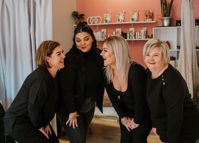 Inge Myburgh Studio team sharing a laugh in Cape Town, Western Cape, ZA, showcasing welcoming atmosphere.