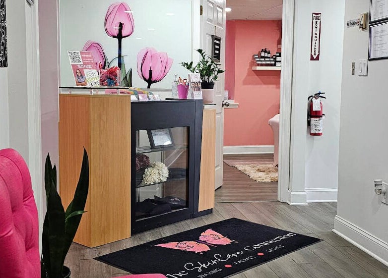 Reception area at The SkinCare Connection, Skin and Lash spa in Bensalem, Pennsylvania, US with pink decor.