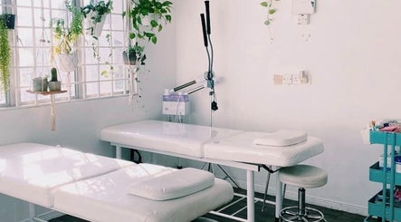 Relaxing treatment room at Beauty Studio 101, Sungai Besi, Selangor, MY, with soothing plants and modern equipment.
