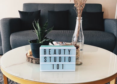 Cozy lounge at Beauty Studio 101 in Sungai Besi, Selangor, MY with plush couch and chic decor.