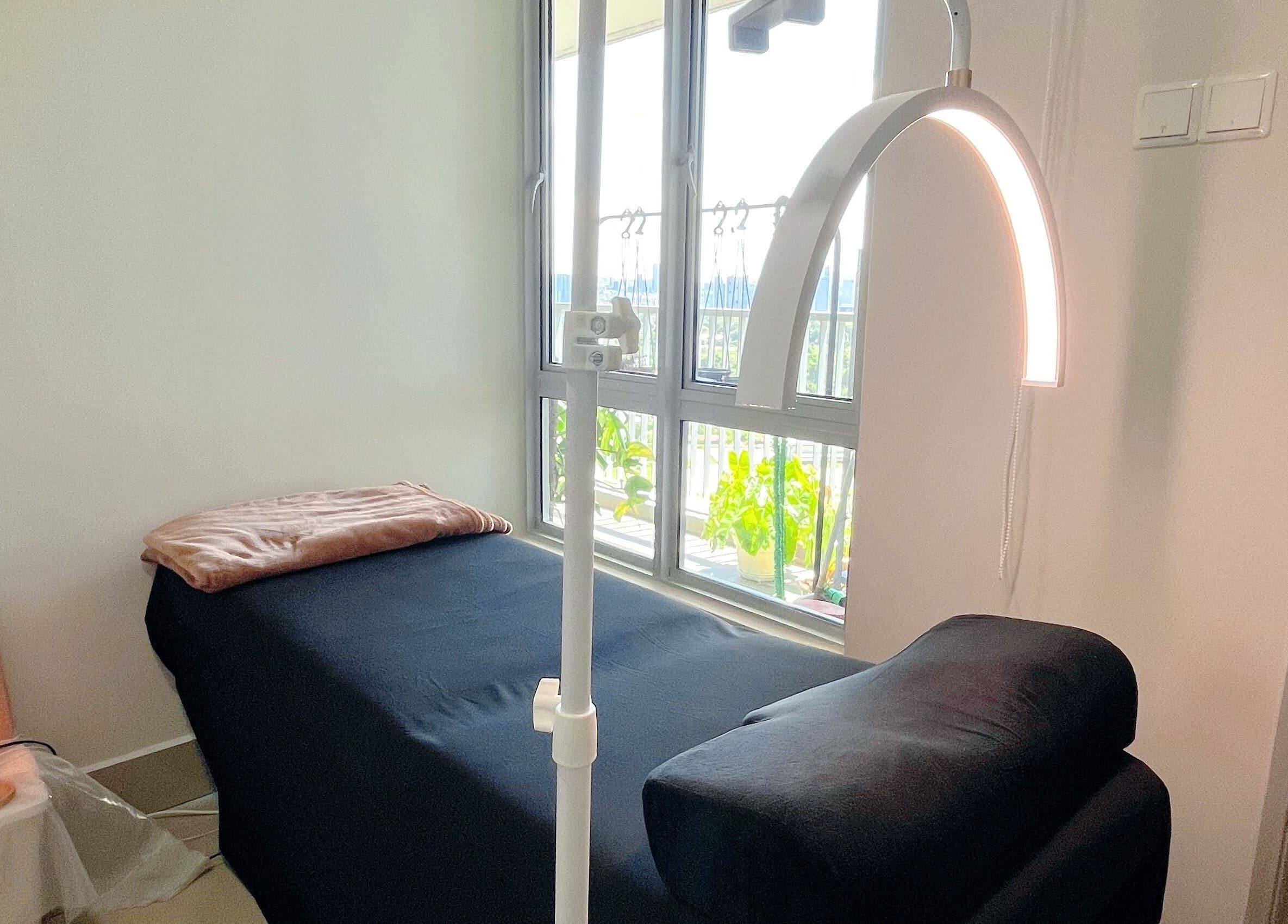 Cozy treatment room at Beauty Studio 101, Sungai Besi, Selangor, MY, with massage bed and soft lighting.