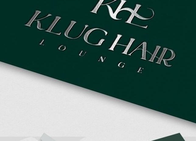 Metallic sign reading 'Klug Hair Lounge' for AmiCable Braids, Grantham, England, GB.