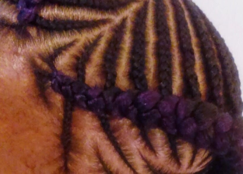 Intricate braids at AmiCable Braids in Grantham, England, GB showcase expert hairstyling.