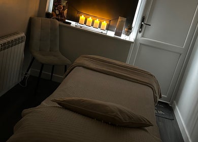 Cozy therapy room with candles at Beauty at No.28 in Blandford Forum, England, GB.