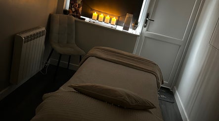 Cozy therapy room with candles at Beauty at No.28 in Blandford Forum, England, GB.