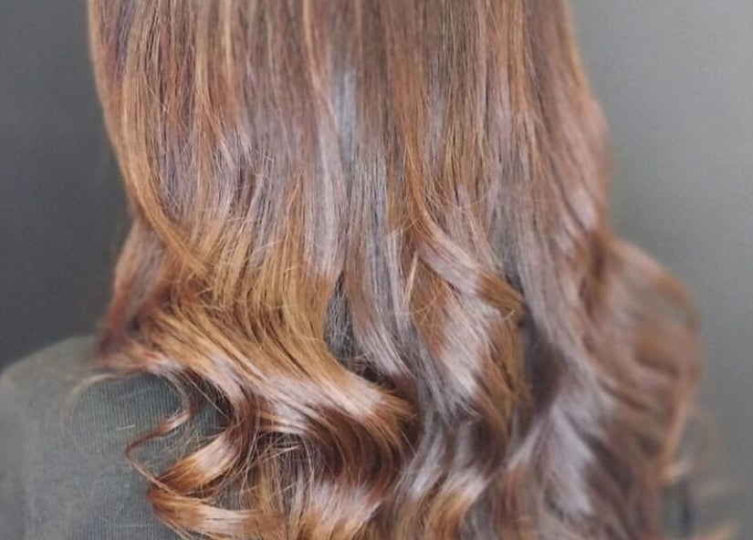 Elegant wavy hairstyle at Hyper Cut Salon in Cape Town, Western Cape, ZA.