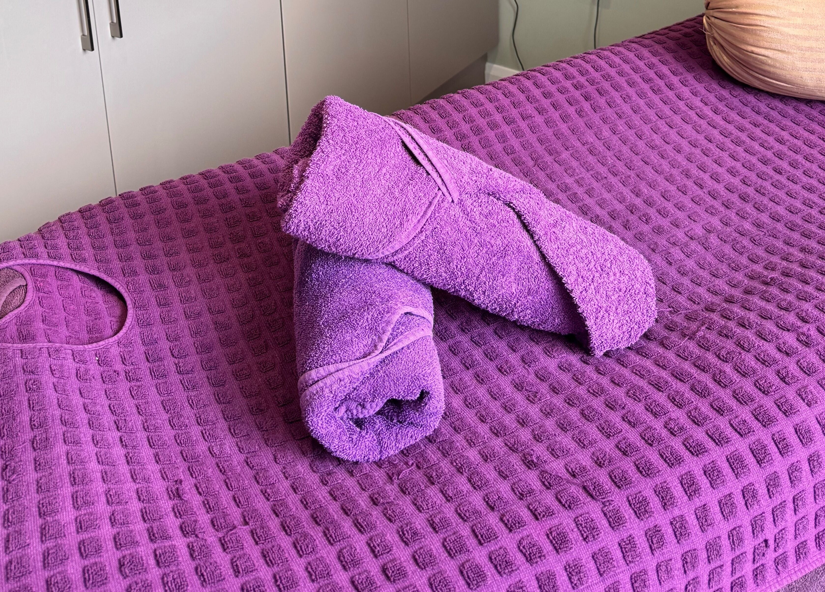 Plush purple massage towels at Retreat, Stockport, England, GB.