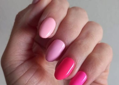 Vibrant pink ombre nails from The Spoil Spot in Benoni, Gauteng, ZA. Perfect for a chic look.
