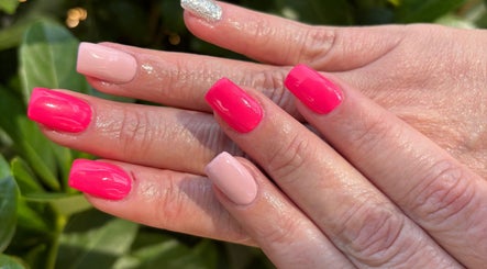 Bright pink and nude manicure from The Spoil Spot, Benoni, Gauteng, ZA, showcasing stunning nail art.