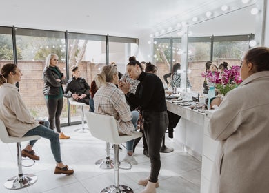 Makeup session at Studio Luxe Collective, Bloemfontein, Free State, ZA with natural light and elegant decor.