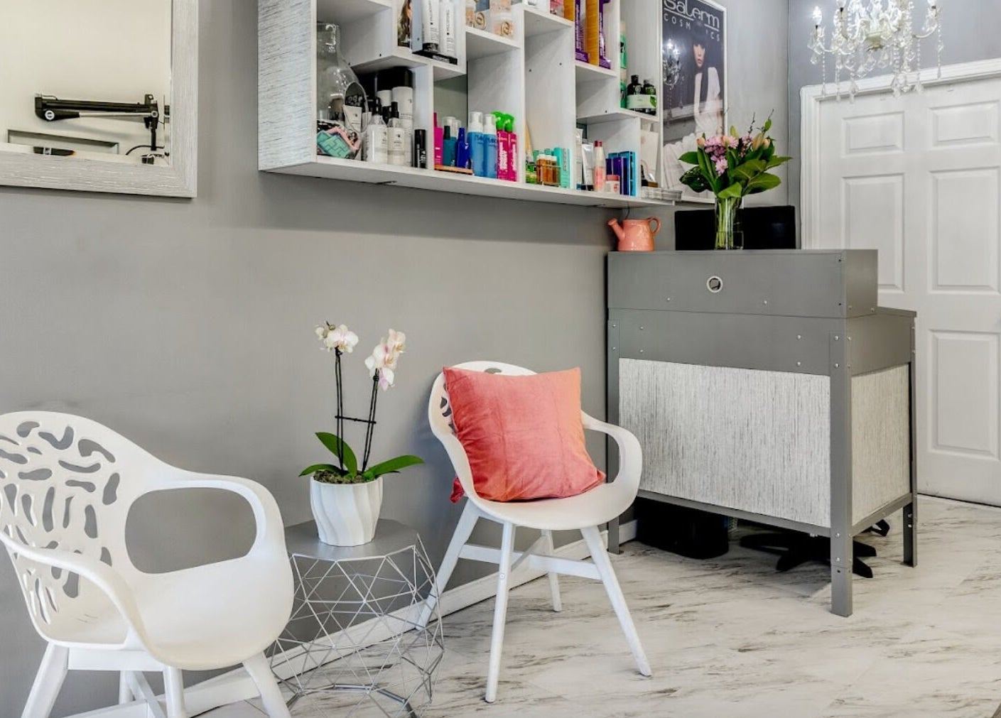 Welcoming lobby of Carin's Hair Studio in Toronto, Ontario, CA with modern decor and elegant seating.