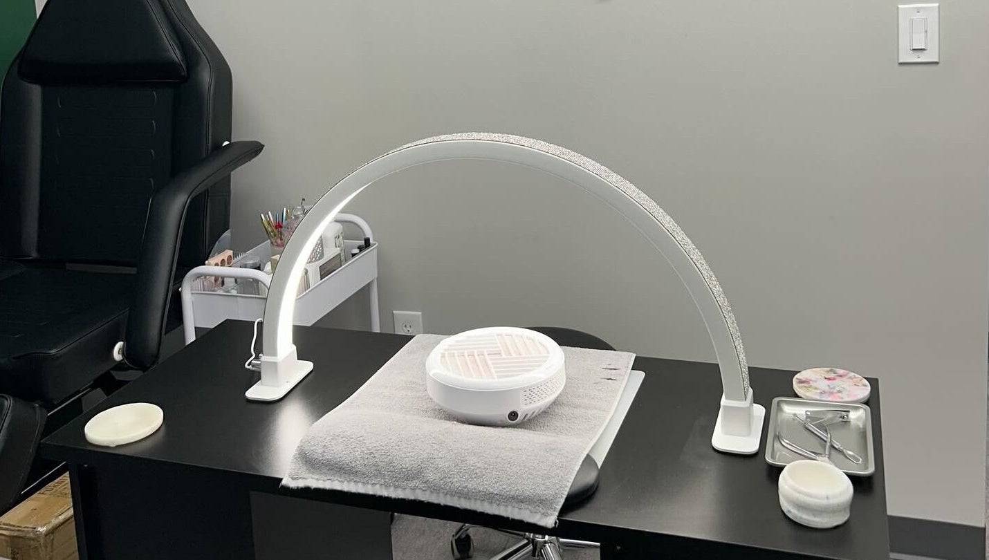 Nail station at Nails by Kzerbs in Willoughby Hills, Ohio, US showcasing tools and a modern setup.