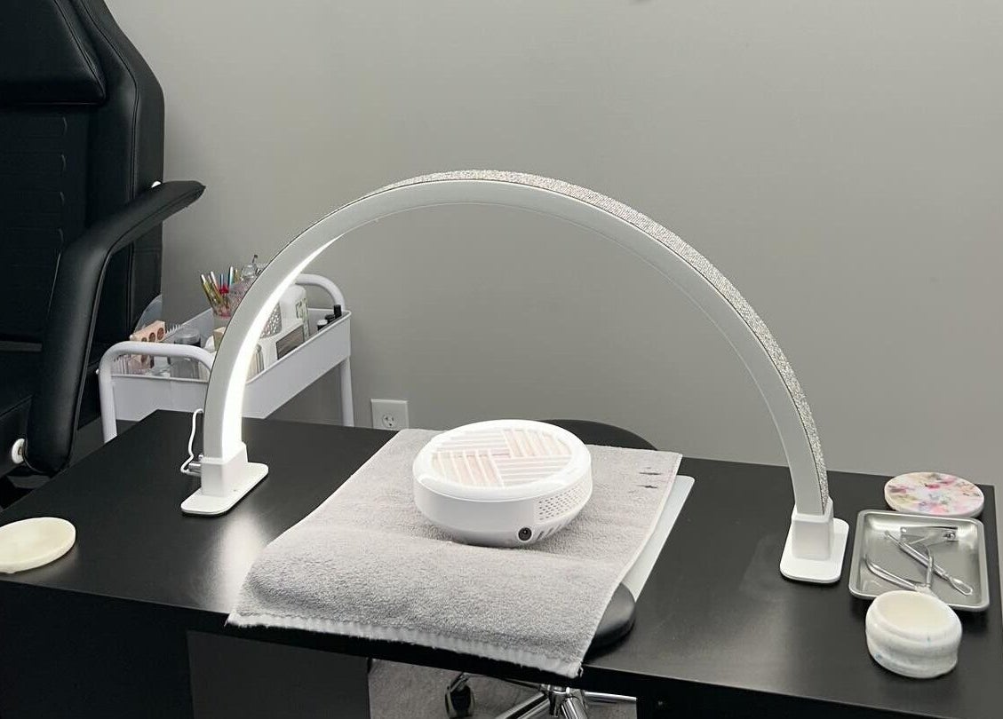 Nail station at Nails by Kzerbs in Willoughby Hills, Ohio, US showcasing tools and a modern setup.