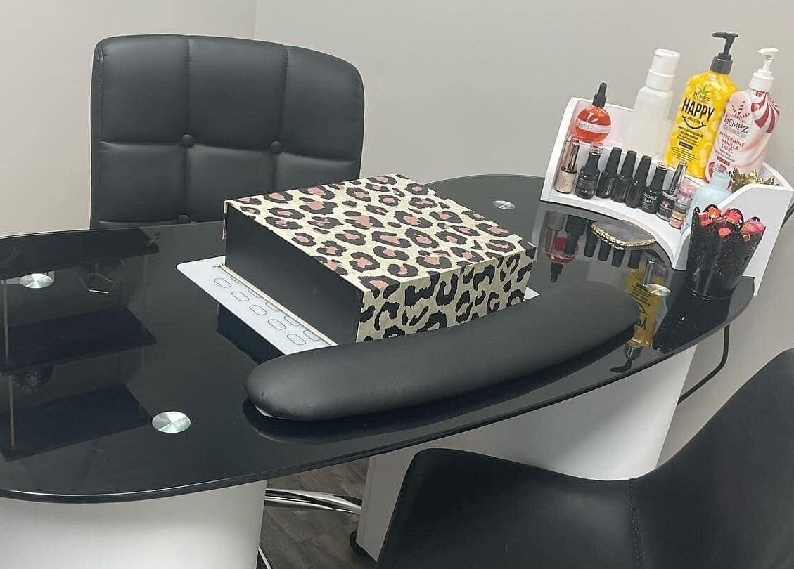 Elegant nail station at Nails by Kzerbs, Willoughby Hills, Ohio, US, featuring stylish decor and beauty products.