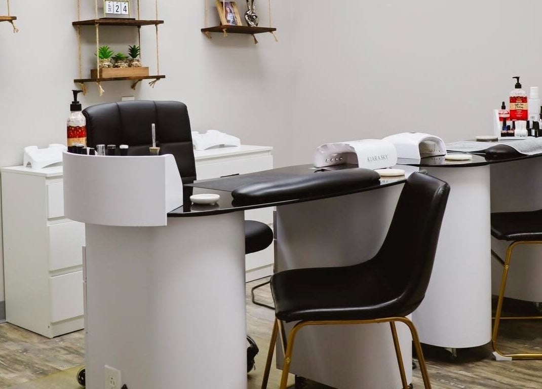 Elegant nail salon setup at Nails by Kzerbs, Willoughby Hills, Ohio, US showcasing stylish manicure stations.