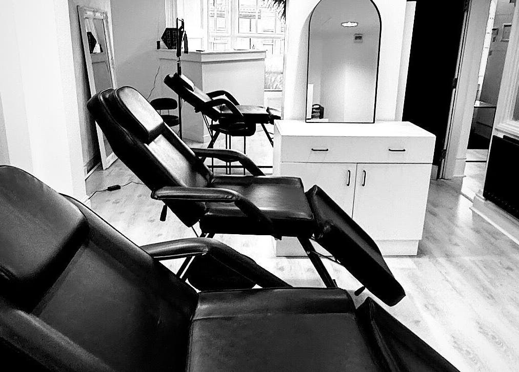 Modern black chairs at NS Aesthetics & Beauty, Shildon, England, GB. Ideal for relaxation and beauty treatments.