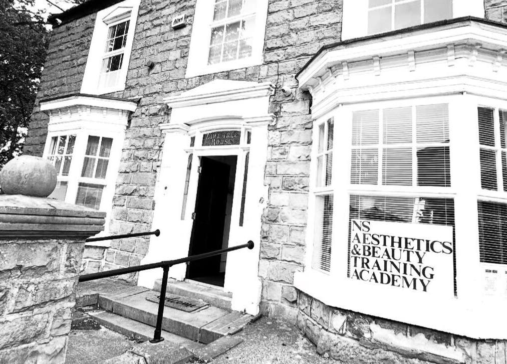 Exterior view of NS Aesthetics & Beauty in Shildon, England, GB showing a welcoming stone entrance.