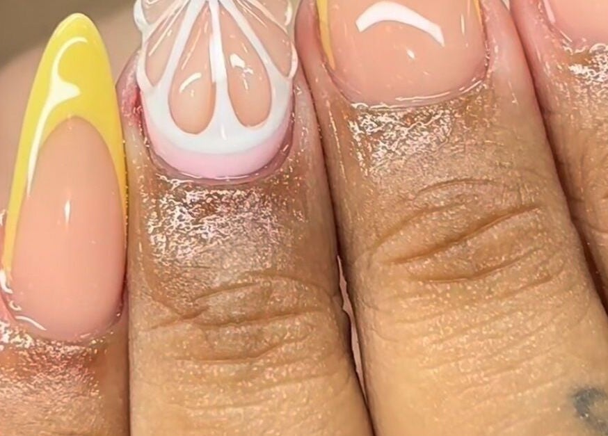 Detailed floral nail design at Zimmanails, Portmore, St. Catherine Parish, JM showcasing intricate artistry.