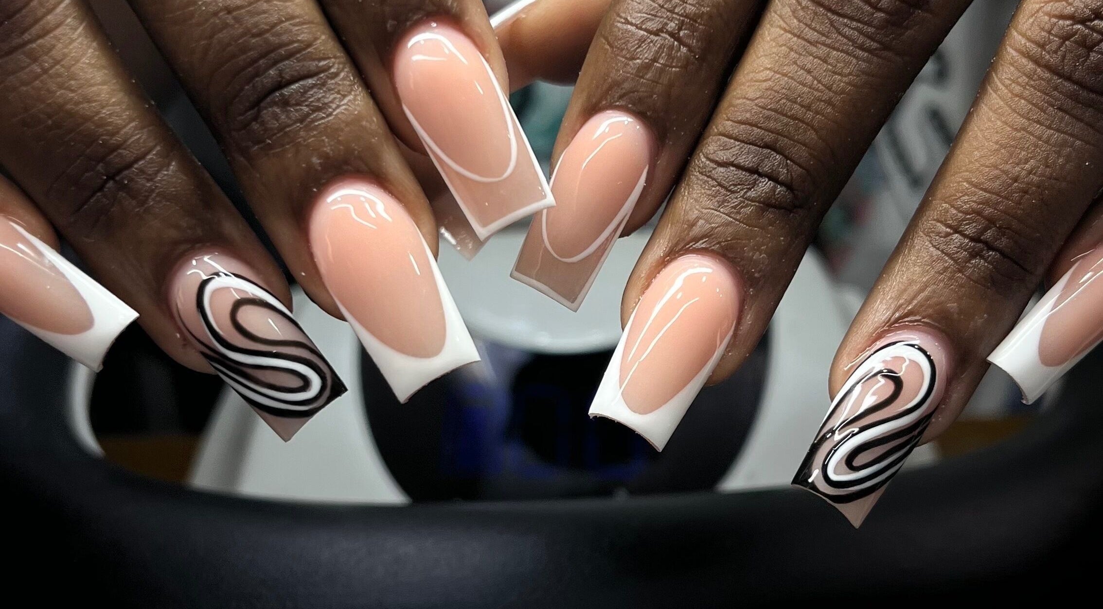Stylish swirl nail art at Zimmanails, Portmore, St. Catherine Parish, JM. Perfect blend of elegance and modern design.
