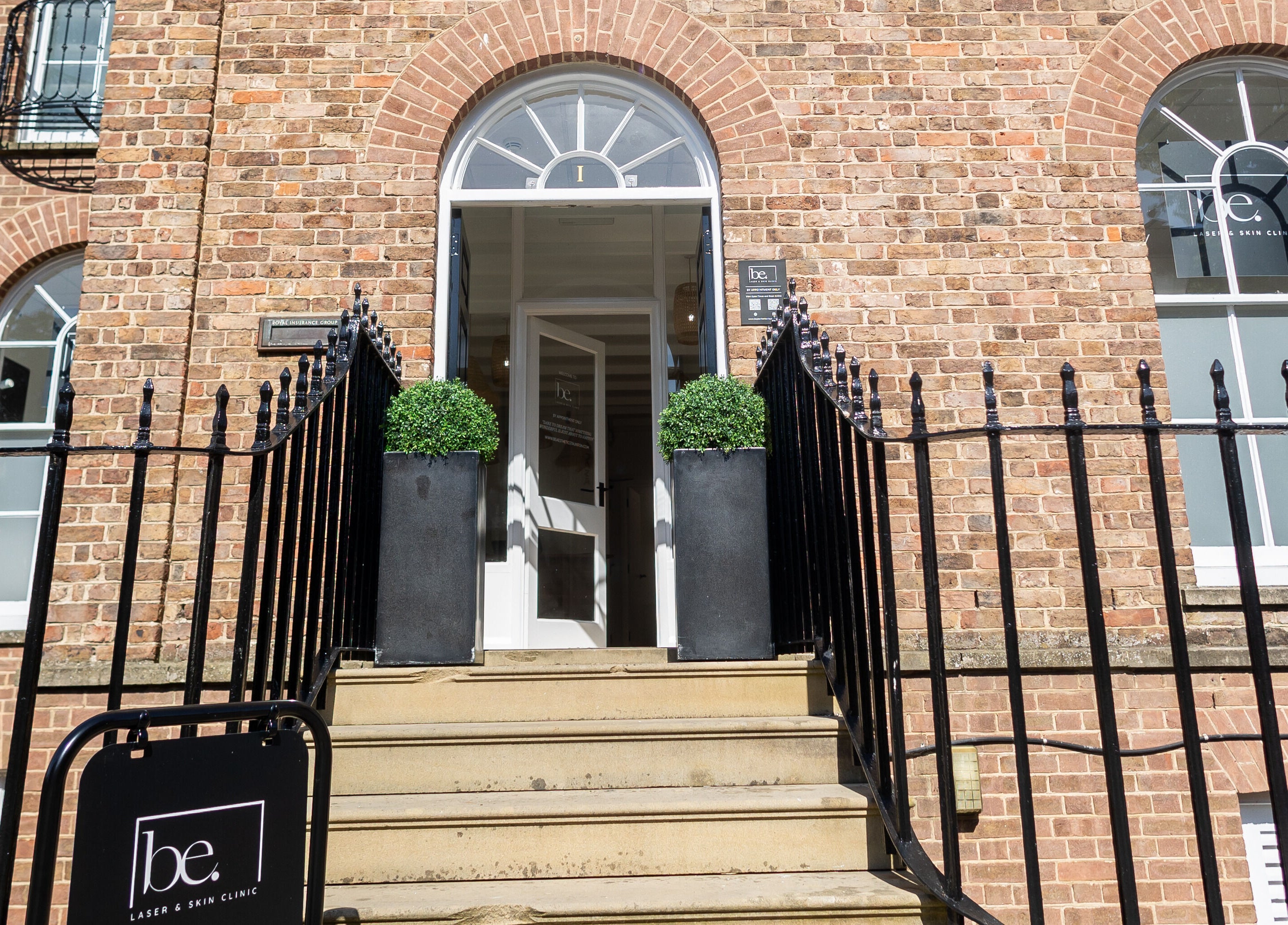 Charming entrance to Be. Laser and Skin Clinic, Taunton, England, GB with welcoming plants.