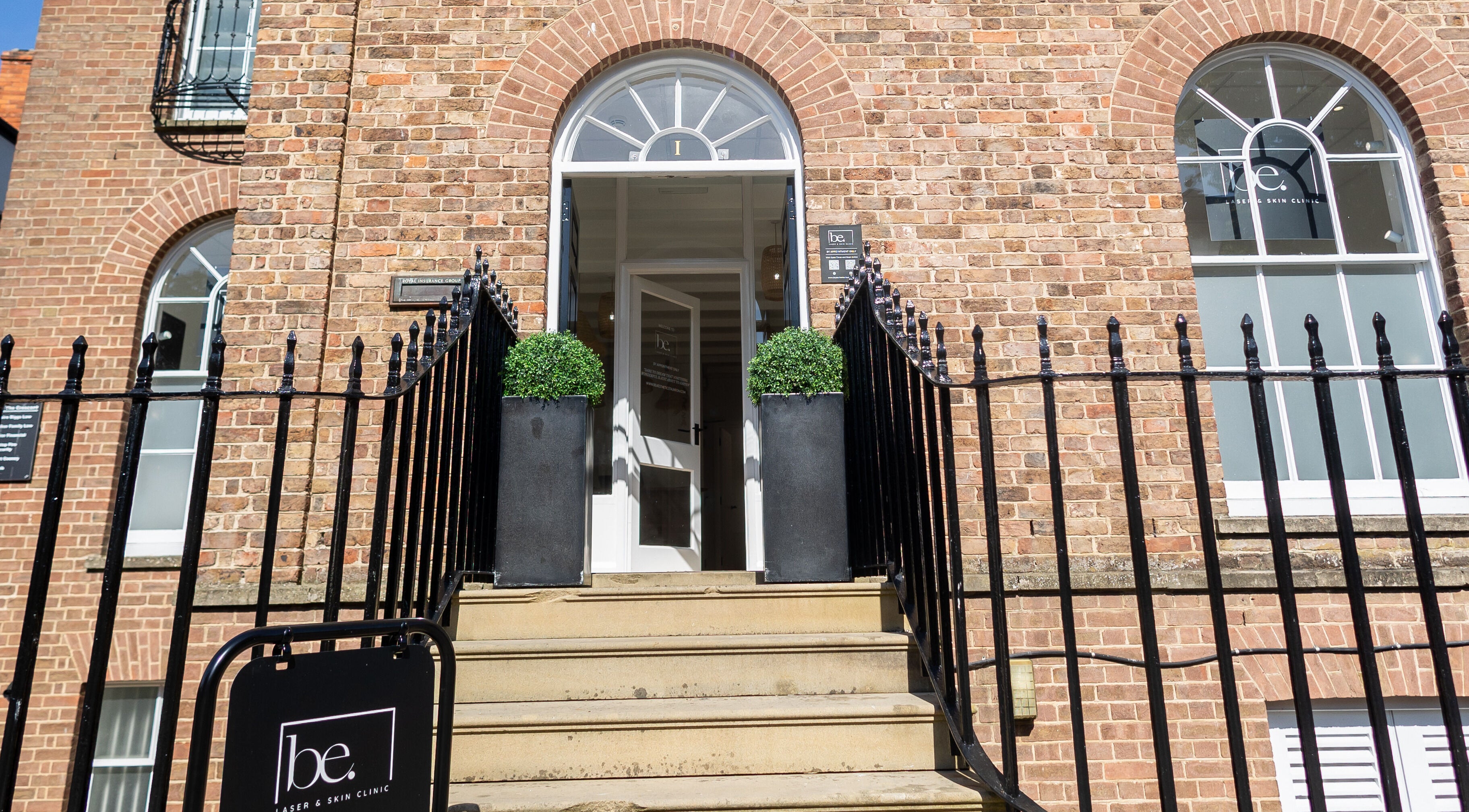 Charming entrance to Be. Laser and Skin Clinic, Taunton, England, GB with welcoming plants.