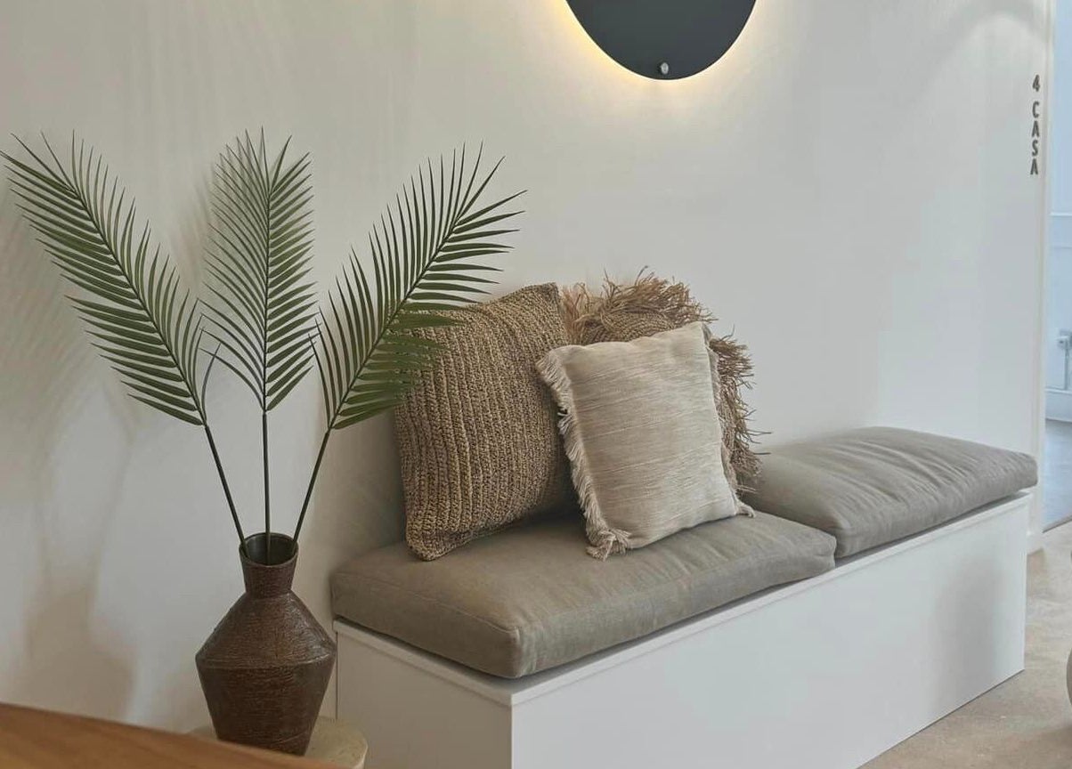 Chic seating area with cushions at Be. Laser and Skin Clinic, Taunton, England, GB.