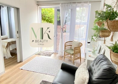 Calming interior of MK Beauty Tokai, Cape Town, Western Cape, ZA with natural light and cozy seating.