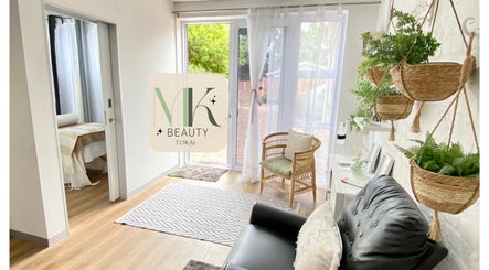 Calming interior of MK Beauty Tokai, Cape Town, Western Cape, ZA with natural light and cozy seating.