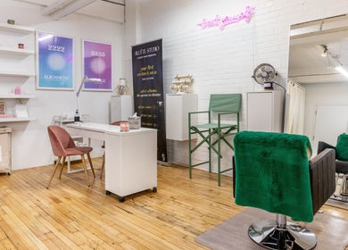 Stylish beauty space at PALM, Montréal, Québec, CA featuring modern decor and salon chairs.