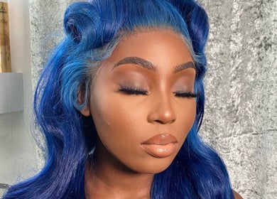 Gorgeous blue-haired model showcasing DXA Beauty's styling in Enfield, England, GB.