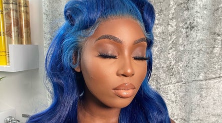 Gorgeous blue-haired model showcasing DXA Beauty's styling in Enfield, England, GB.