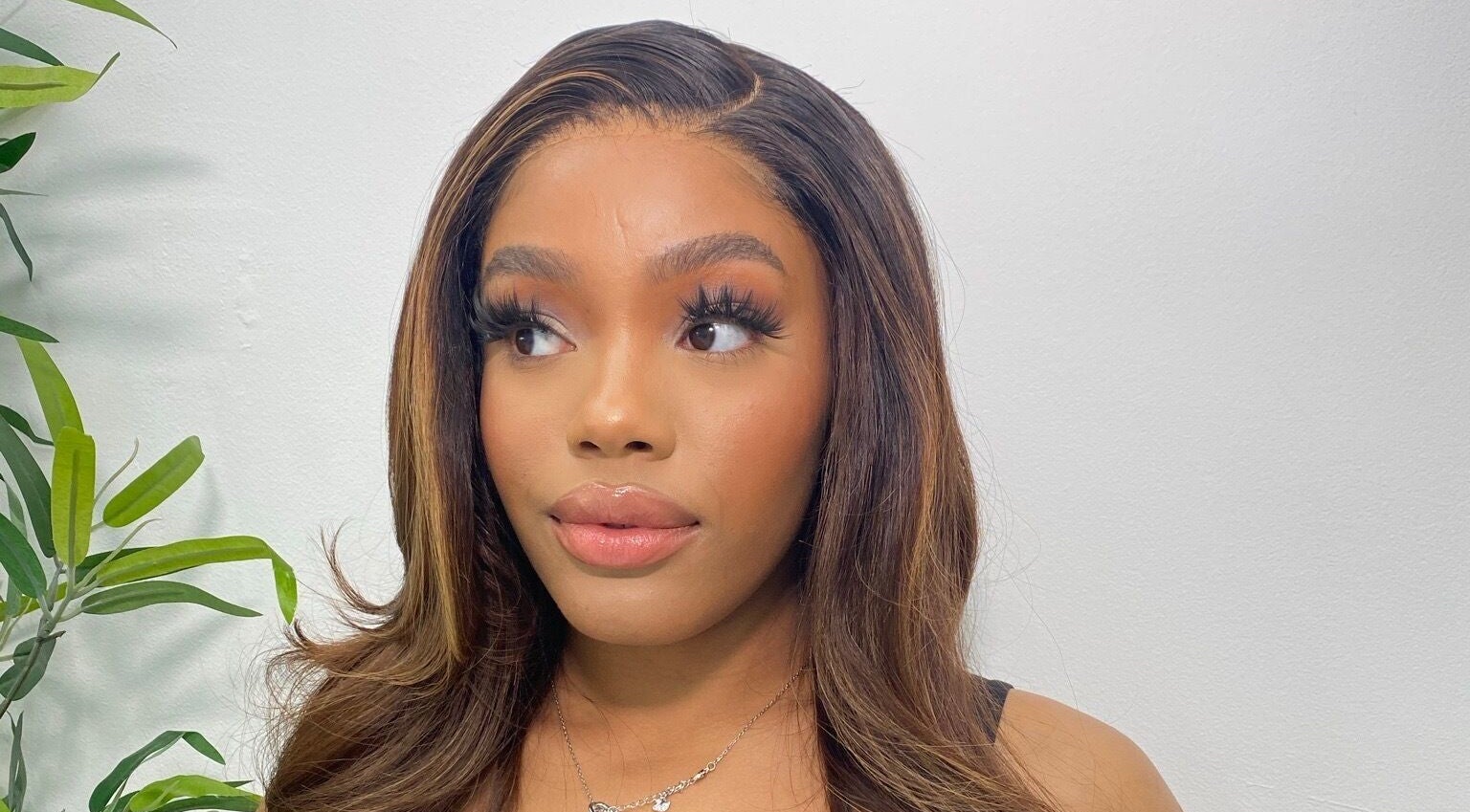 Radiant beauty look by DXA Beauty in Enfield, England, GB featuring long lashes and styled hair.