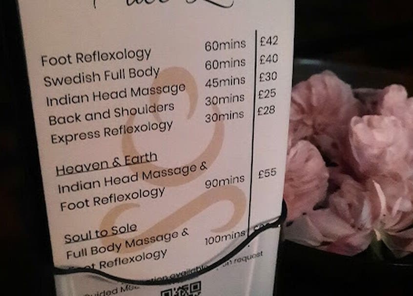 Soul Bliss with Sayyada menu featuring reflexology services and flower decor in Tamworth, England, GB.