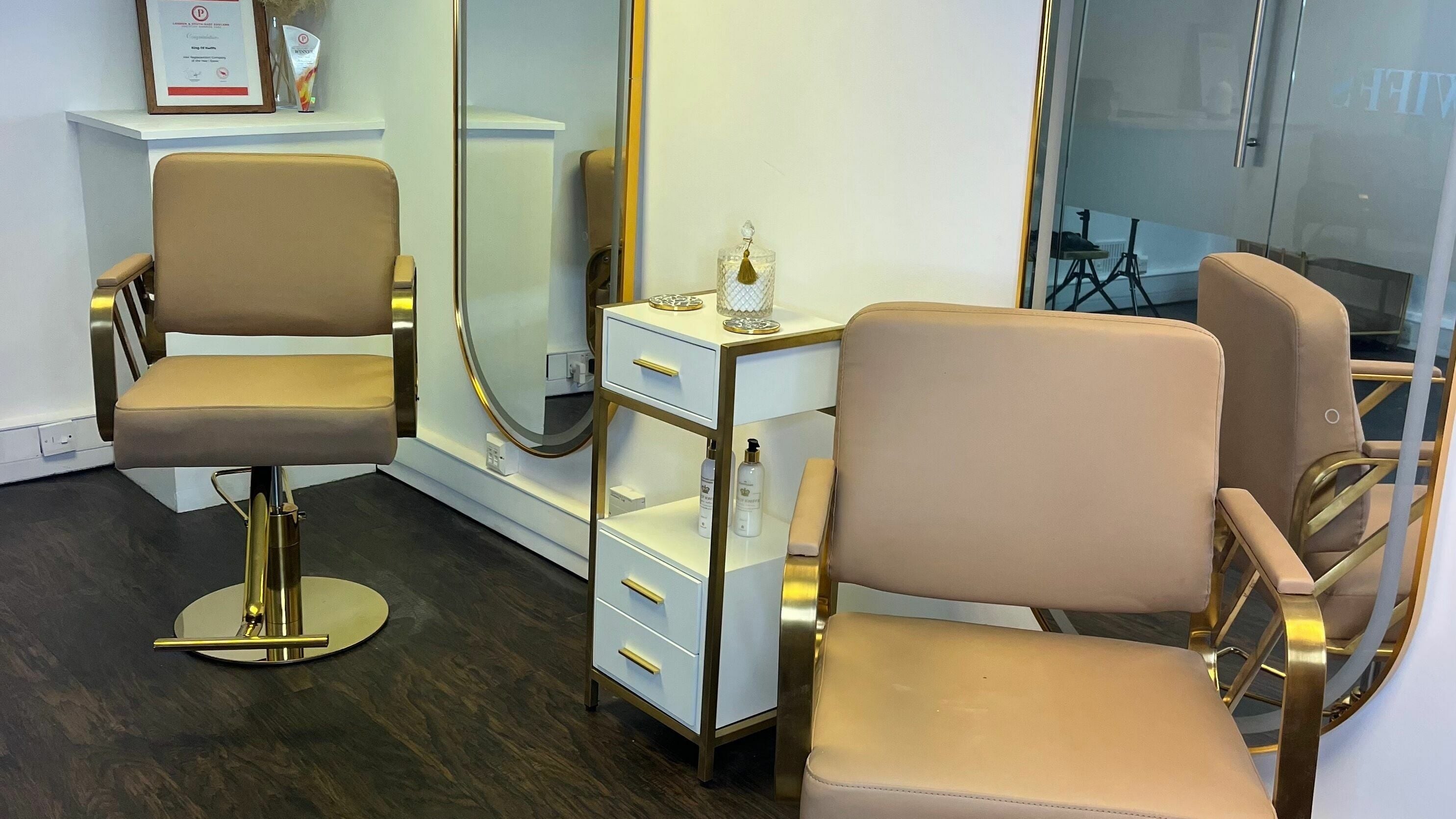 Elegant salon chair and mirror at Kings of Kwiffs Essex, Witham, England, GB.
