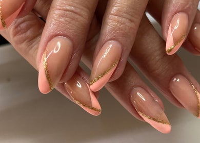 Elegant nails with pink and gold design at Infinite, Benoni, Gauteng, ZA.