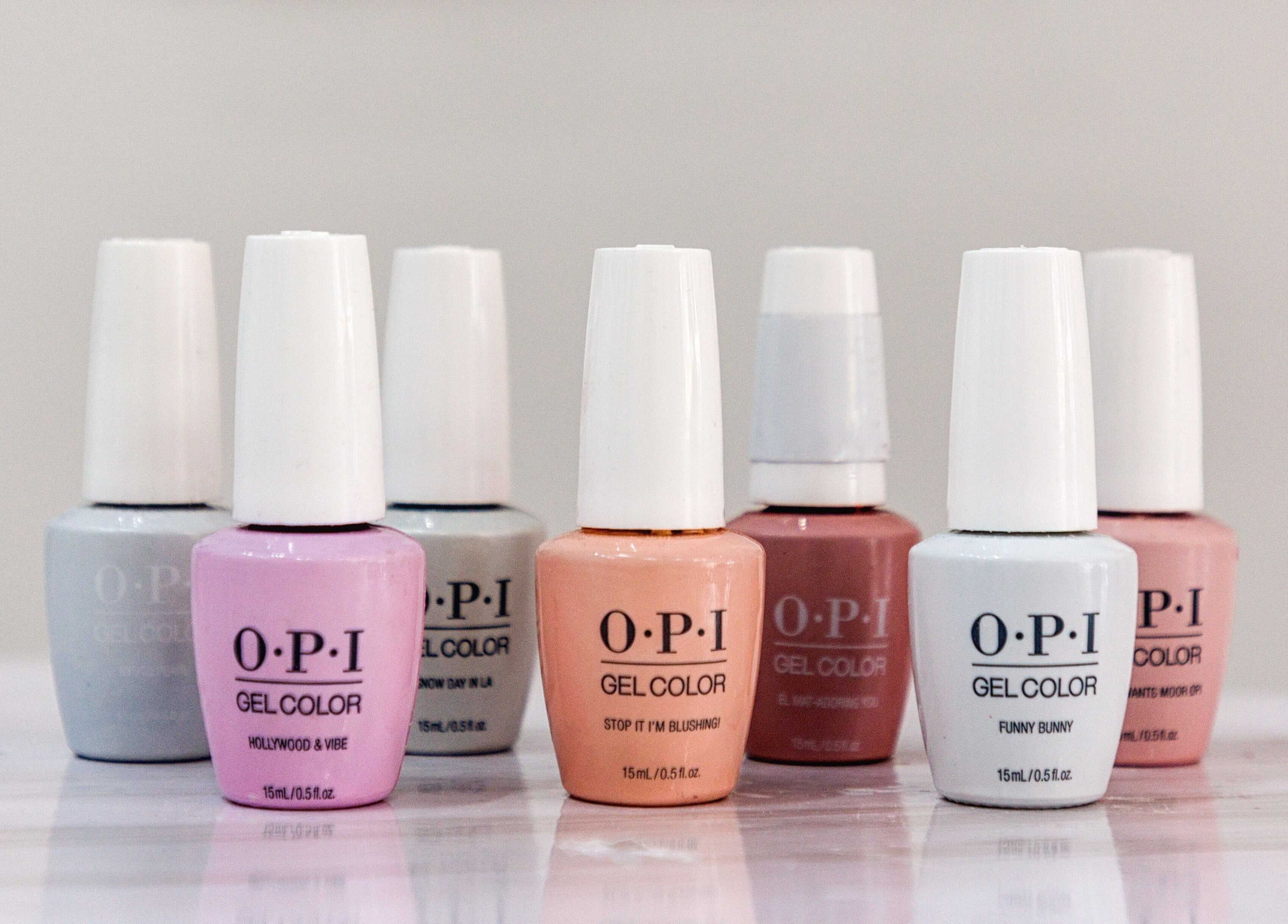 Colorful nail polishes at Blush Nail Bar in London, England, GB, showcasing a variety of gel shades.