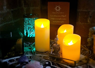Serene candles and Buddha statuette at Lynne Helliwell Reiki Training Holistic Coaching, Failsworth, England, GB.