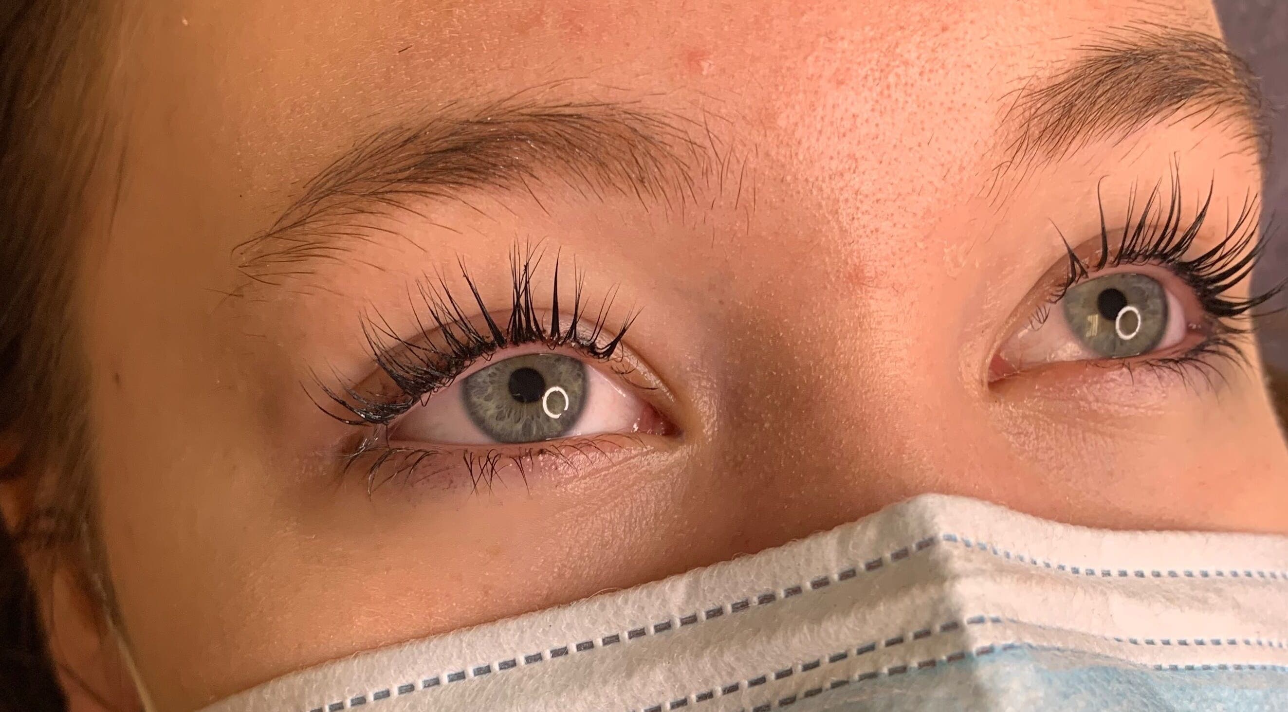 Close-up of eyelash extensions at Sidney Aesthetics in Owen Sound, Ontario, CA, showcasing meticulous beauty work.