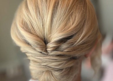 Sophisticated blonde updo at Megan Gribbon Hair, Torquay, England, GB.