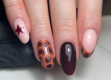 Unique nail art with star and tortoiseshell design by By Brooke Coles, Blackwood, Wales, GB.
