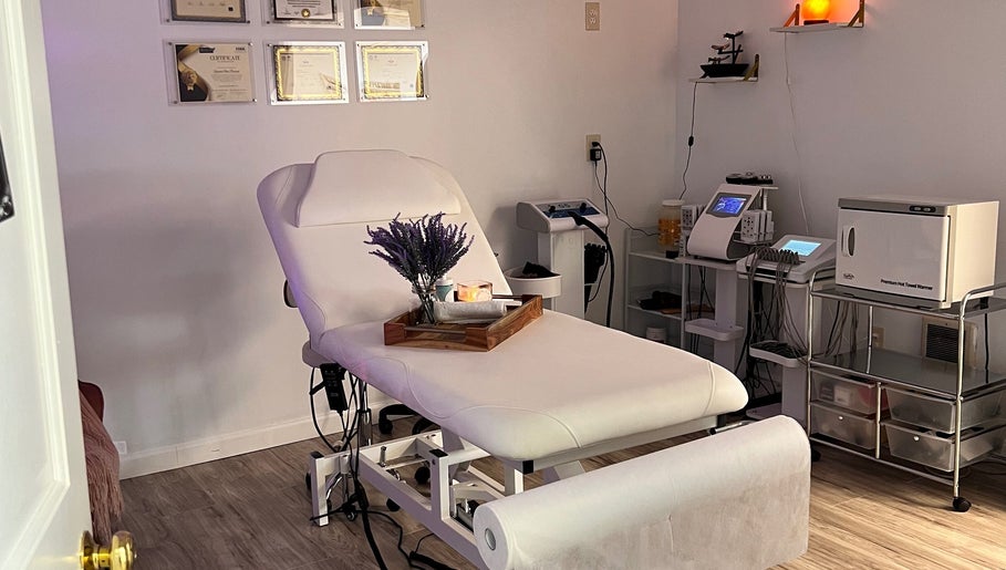 Relaxing spa room at Brazilian Beauty Spa in Peabody, Massachusetts, US with a massage table and soft lighting.